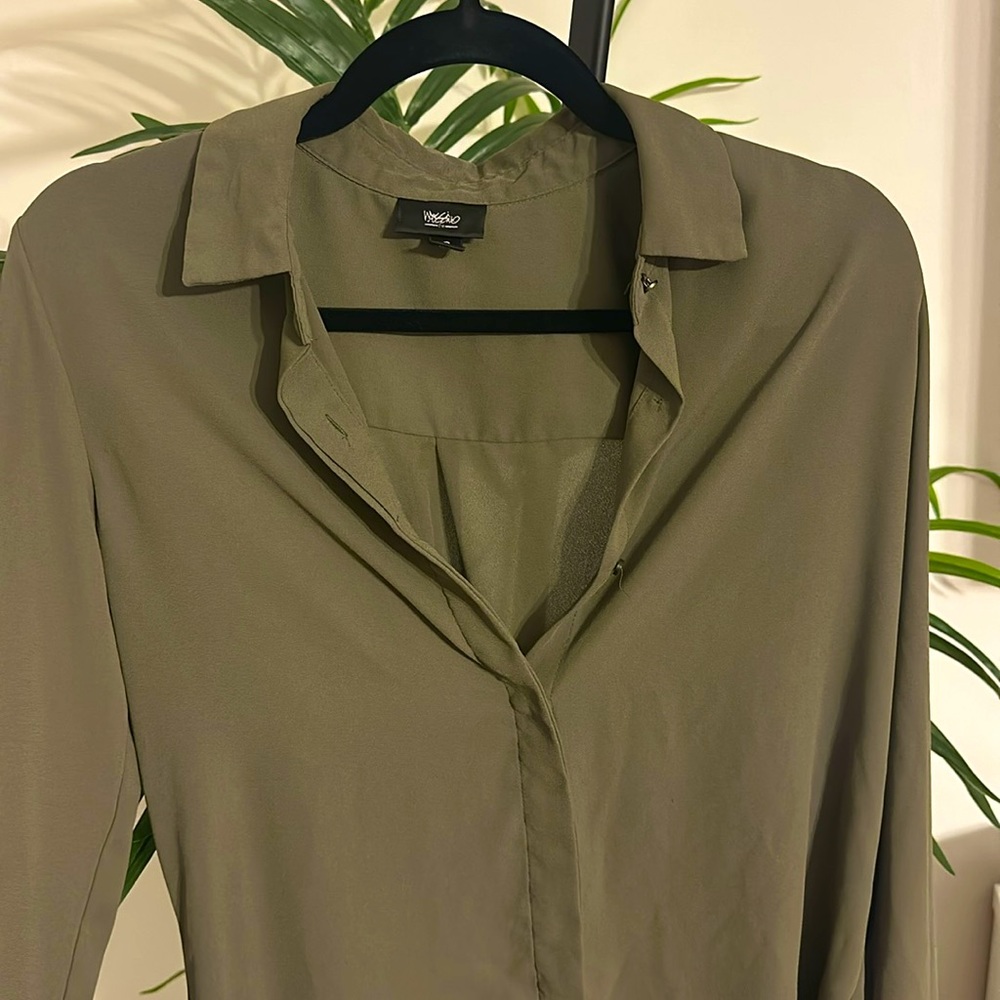 Green button up shirt